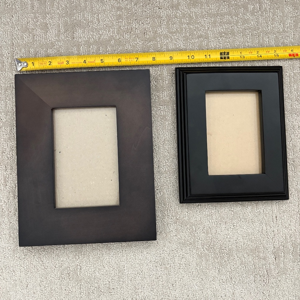 2 black frames, Crate & Barrel and unknown.